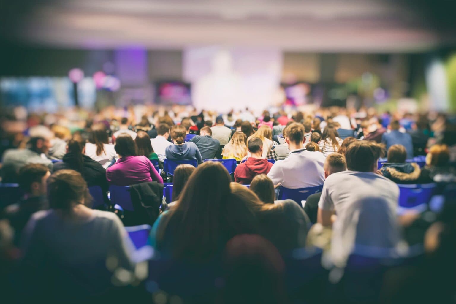 participants listening to a conference.